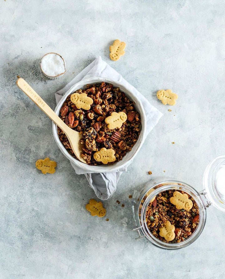 A bowl of granola with mini gingerbread men