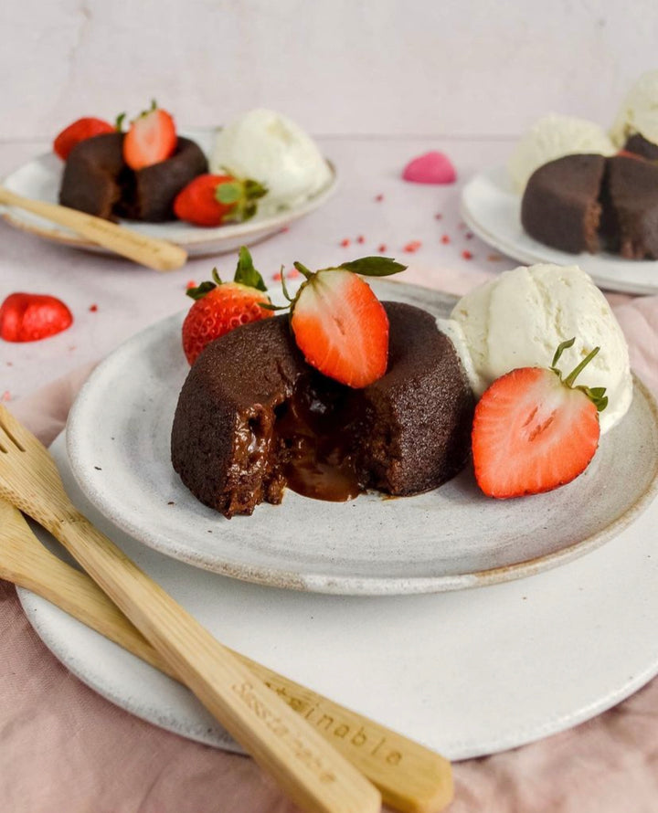 Chocolate lava cake with ice cream and strawberries