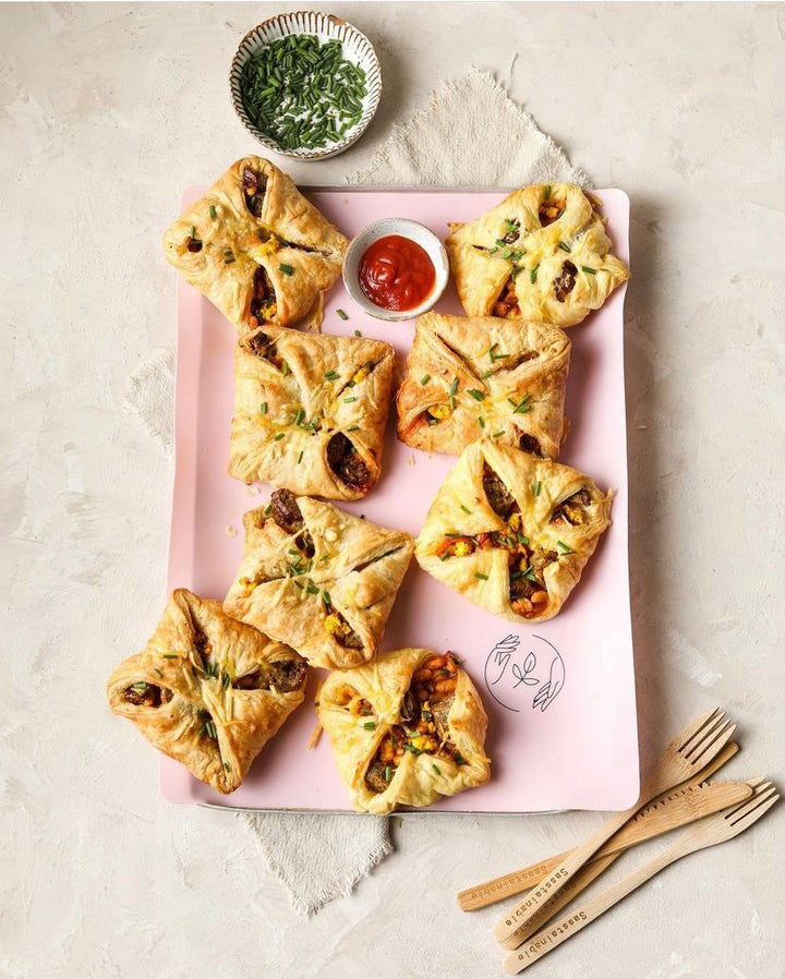 breakfast pastries on a baking sheet